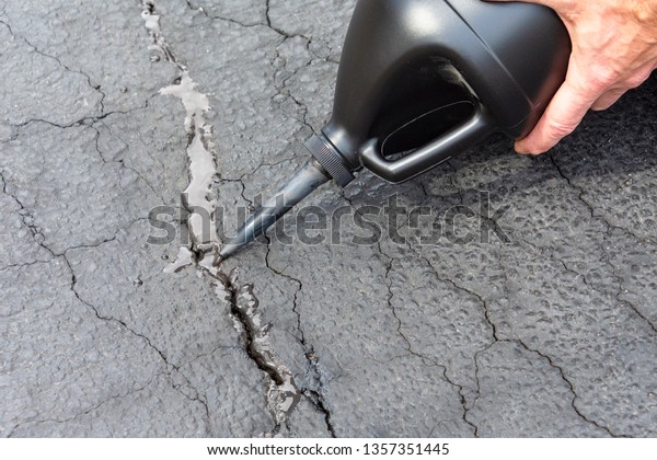 Featured image for Cracks Forming in Driveway Surface? Reasons and Repair Methods