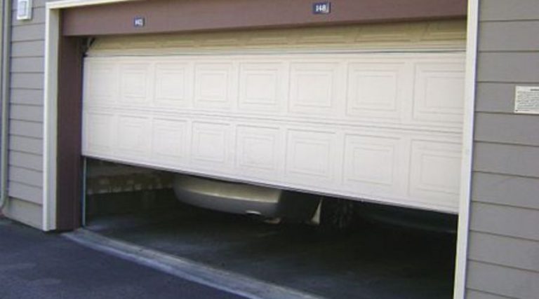 Content image for Garage Door Not Opening Smoothly? Common Track and Motor Issues