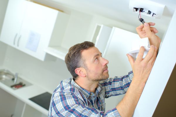 Featured image for Smoke Detectors Beeping Randomly? How to Fix False Alarms